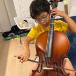 Alan Kim Instagram - I worked hard to learn cello. 😅😅but too difficult. 😅😅 @appletvplus Special thanks to #Kevantorfeh @h.anna.bae @caseyk.mp3