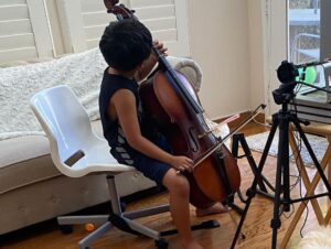 Alan Kim Instagram - I worked hard to learn cello. 😅😅but too difficult. 😅😅 @appletvplus 
Special thanks to #Kevantorfeh @h.anna.bae @caseyk.mp3