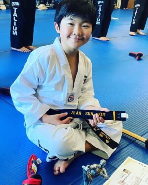 Alan Kim Instagram - Finally, I got a black belt. 🥋yayyyy! I’m so happy! Thank you so much @masterlee.talium  and @taekwonkids_mv 💕💕