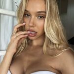 Alexis Ren Instagram - I love playing dress up and make believe. As a young girl, I made outfits for each day of the week and lined them up on my bed. I watched my mom do her makeup, the counter covered with eyeshadow and lipstick. No matter how busy the day was as a mom with 4 kids, she always looked her best. I remember seeing her and understanding that beauty wasn’t meant to bury who we are but express more of who we are—that we can dress like who we wish to become. I’d have my friends play with their camera and we’d go on walks and take photos of each other. My childhood passion quickly became my adulthood career. But as I got older, it wasn’t make believe anymore. Beauty became my armor because it was the mask that I was most comfortable wearing. The problem with wearing a mask for too long, is that we can forget our own face. I had to reach back in time and reconnect with that little girl who knew that dress up is not the same as covering up. People tend to define growth as milestones that are visible to others. Yet, I have found in my own life that sometimes all that needed to change was my intention behind what I do, not that I should stop doing it. I didn’t need to stop taking photos or change my social media in order to heal. I needed to redefine my why, to decide what story I was telling. In doing so, I stopped trying to confine myself to these little square boxes. I did so many things for the wrong reasons. Now I’m still doing them, but for the right ones. I accept this side of me because I no longer see a girl wearing a mask. I see 12-year-old Alexis, excited to play dress up. I watch myself do this to others—our brains want to easily define people, because it is so much easier to see someone as one thing, instead of embrace that they have a little bit of everything in them. But my god, we all deserve the grace of change. The ability to redefine ourselves again and again. It’s a lifelong practice. A lot of the times, when I think I’m setting myself free from a box, it’s only because I’ve moved my attention to another one that I think is my answer. But it never is. *continued in comments* —