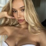 Alexis Ren Instagram - I love playing dress up and make believe. As a young girl, I made outfits for each day of the week and lined them up on my bed. I watched my mom do her makeup, the counter covered with eyeshadow and lipstick. No matter how busy the day was as a mom with 4 kids, she always looked her best. I remember seeing her and understanding that beauty wasn’t meant to bury who we are but express more of who we are—that we can dress like who we wish to become. I’d have my friends play with their camera and we’d go on walks and take photos of each other. My childhood passion quickly became my adulthood career. But as I got older, it wasn’t make believe anymore. Beauty became my armor because it was the mask that I was most comfortable wearing. The problem with wearing a mask for too long, is that we can forget our own face. I had to reach back in time and reconnect with that little girl who knew that dress up is not the same as covering up. People tend to define growth as milestones that are visible to others. Yet, I have found in my own life that sometimes all that needed to change was my intention behind what I do, not that I should stop doing it. I didn’t need to stop taking photos or change my social media in order to heal. I needed to redefine my why, to decide what story I was telling. In doing so, I stopped trying to confine myself to these little square boxes. I did so many things for the wrong reasons. Now I’m still doing them, but for the right ones. I accept this side of me because I no longer see a girl wearing a mask. I see 12-year-old Alexis, excited to play dress up. I watch myself do this to others—our brains want to easily define people, because it is so much easier to see someone as one thing, instead of embrace that they have a little bit of everything in them. But my god, we all deserve the grace of change. The ability to redefine ourselves again and again. It’s a lifelong practice. A lot of the times, when I think I’m setting myself free from a box, it’s only because I’ve moved my attention to another one that I think is my answer. But it never is. *continued in comments* —