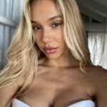 Alexis Ren Instagram - I love playing dress up and make believe. As a young girl, I made outfits for each day of the week and lined them up on my bed. I watched my mom do her makeup, the counter covered with eyeshadow and lipstick. No matter how busy the day was as a mom with 4 kids, she always looked her best. I remember seeing her and understanding that beauty wasn’t meant to bury who we are but express more of who we are—that we can dress like who we wish to become. I’d have my friends play with their camera and we’d go on walks and take photos of each other. My childhood passion quickly became my adulthood career. But as I got older, it wasn’t make believe anymore. Beauty became my armor because it was the mask that I was most comfortable wearing. The problem with wearing a mask for too long, is that we can forget our own face. I had to reach back in time and reconnect with that little girl who knew that dress up is not the same as covering up. People tend to define growth as milestones that are visible to others. Yet, I have found in my own life that sometimes all that needed to change was my intention behind what I do, not that I should stop doing it. I didn’t need to stop taking photos or change my social media in order to heal. I needed to redefine my why, to decide what story I was telling. In doing so, I stopped trying to confine myself to these little square boxes. I did so many things for the wrong reasons. Now I’m still doing them, but for the right ones. I accept this side of me because I no longer see a girl wearing a mask. I see 12-year-old Alexis, excited to play dress up. I watch myself do this to others—our brains want to easily define people, because it is so much easier to see someone as one thing, instead of embrace that they have a little bit of everything in them. But my god, we all deserve the grace of change. The ability to redefine ourselves again and again. It’s a lifelong practice. A lot of the times, when I think I’m setting myself free from a box, it’s only because I’ve moved my attention to another one that I think is my answer. But it never is. *continued in comments* —