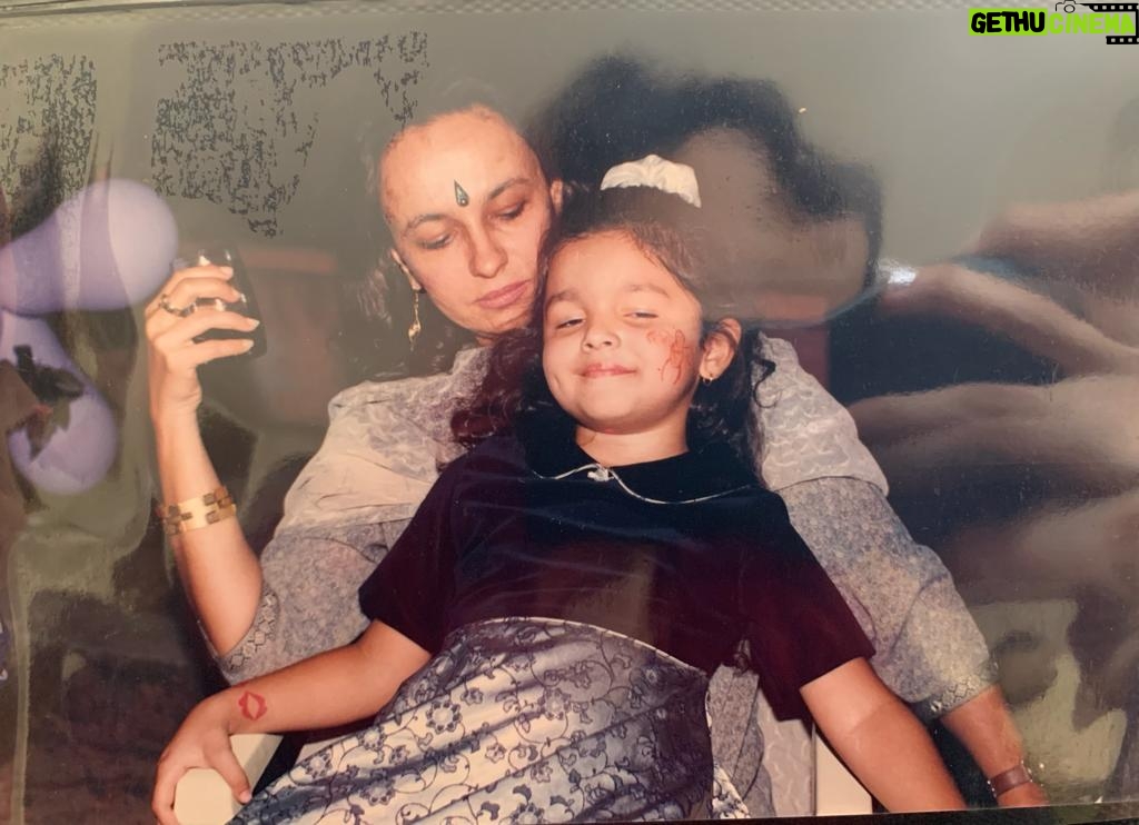 Alia Bhatt Instagram - On your birthday I look back at one of my birthdays.. I spent the whole party sitting on your lap cause I was too scared of the inflated Godzilla which I drove you up the wall to get me.. But nonetheless I look perfectly content and happy and clearly there’s no place I’d rather be.. Happy birthday mothership .. we’d be nothing without you.. grateful for you every single minute every single day.. love you ♥ @sonirazdan