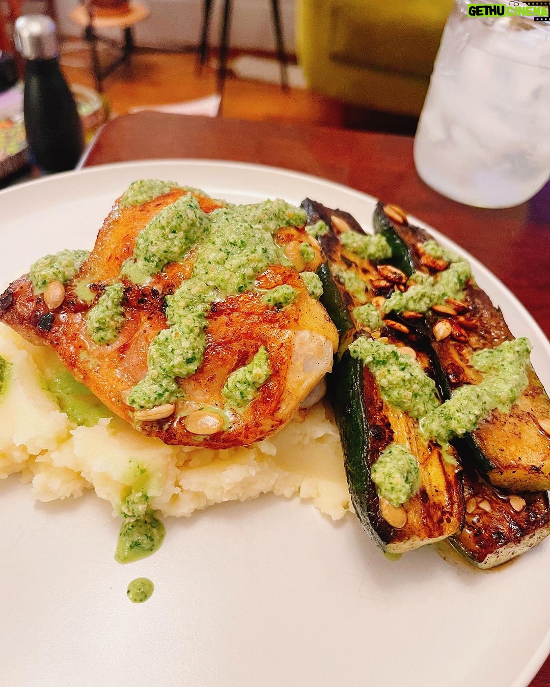 Alicia Garza Instagram - Chicken thighs with crispy skin meets mashed potatoes with charred zucchini and a delicious herby sauce…sauce is made from buttermilk, cilantro, garlic, pumpkin seeds, lemon and jalapeño… vacation looks good on me, yes indeed. #SometimesICook