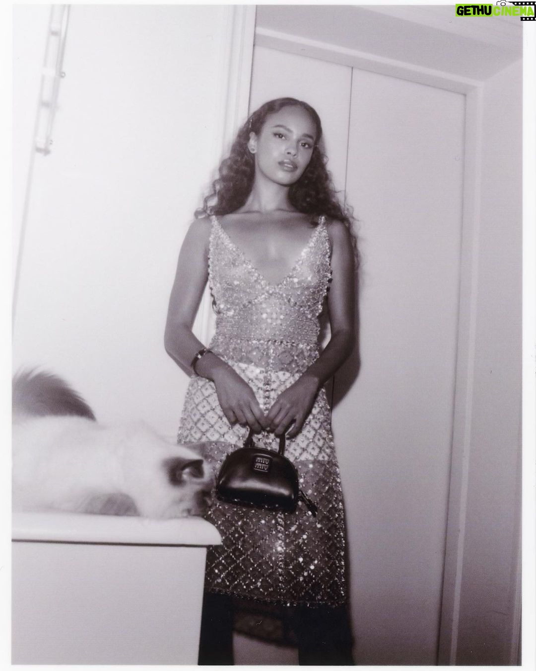Alisha Boe Instagram - Paris with @miumiu was a dream. A beautiful collection, congrats ms. Prada and Fabio ❤️ so grateful to have witnessed it 🫶🏽 Thank you @priyasatiani for being the best date. Styling by my love @itsamandalim Hair by @naivashaintl Makeup by @harold_james Photos by @jeremybarniaud And a special appearance by the bougiest pussycat in Paris, Socrates. Paris, France
