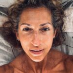 Alysia Reiner Instagram - Birthday selfie. No makeup. No filter. No filler. Wrinkles, freckles (sun damage), grey hair & cellulite included. My birthday present to myself is cultivating more self love and worthiness AS IS. Those of you who know me know it is tattooed on my wrist ( along with my @msmarvelofficial lightening bolt!) to remind myself to love the world as it is. But this year I want to go deeper loving MYSELF as is , feeling worthy and enough, unemployed, wrinkles, bumpy nose, crepy skin , cellulite, gray hair, and all. It’s a privilege to make it this far in my life. Some of my friends died in their 40s. Some younger, some older. missing you today Barbara, Racheal, Heather, Patricia, & Owen. Also my daddy & Davids dad ( 55 & 47 respectively). It’s a privilege to age. Im learning this, as much as the capitalist patriarchy wants to sell me so much shit to stop the process. It’s been an incredible life so far so many dreams come true, so many dreams I didn’t even know I had : becoming a volunteer fire fighter, becoming a foster mom, I never even dreamed of having { a healthy relationship with} a teen daughter, and look at this one! Being an activist, producing movies, learning tennis! I love continuing to learn new things to feel like a beginner, and it’s deep discomfort, and to evolve through that. Thank you beloved friend and happens to be brilliant life coach @julieanne.lee for teaching me more about my own worth. Thank you @jessicadefino_ for inspiring me to love myself, free of filter and fillers, warts, and all. Thank you L & D FOR ALL MY INCREDIBLE HOMEMADE PRESENTS MY FAVORITE KIND. AND THANK YOU. @sophchangnyc For taking these super fun pictures and visiting us here in my favorite place on the planet. #thesearethegoodolddays #birthdaygirl #birthdayselfie #asis Saltaire, Fire Island, NY