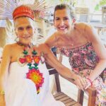Alysia Reiner Instagram – This is @gurmukh108.
Please join me in wishing her a happy 80th birthday! Here is to 80 more! If anyone could live to 160, she is the one!!!
She is Liv’s spiritual godmomma, but really she is mine too.
I went to Telum this weekend to celebrate her magic and the blessing of her 80 years. She fed us cake from her hands, and we covered her in rose petals.
She is what GOD – MOM means to me – she teaches me about what it means to be spiritual and human, a momma and a deeply imperfect but Devine connected soul living on this planet at this time. She is stunningly beautiful inside and out and inspires me with her inner and outer radiance and beauty and EVERY TIME I AM WITH HER I LEARN AND GROW. EVERY TIME. She teaches me about aging blissfully – not gracefully – BLISSFULLY! She is a wonder and wanderer – she travels and adventures and teaches all over the world, at 80!! She is a community builder, she is an orphanage builder, she is a soul builder. She never wants to be a Guru, but she has helped COUNTLESS souls. She creates a family of friends I love beyond words. I am so grateful to her extraordinary beloved blood family for sharing her with us all, i love them so!
She is pure love. She is a healer. She is magic. Thank you Gurmukh for being in our lives, for being the light. For carrying the light. I love you to infinity. Tulum, México