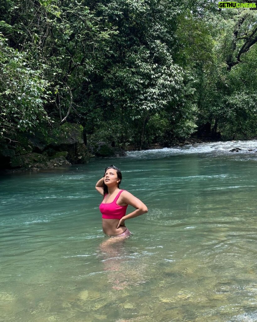 Amala Paul Instagram - Dancing in nature's symphony, where raindrops and waterfalls collide. 🌧️💦🌸 #RainyJungleDays #WaterfallWonders #NatureEnchantment #junglelove #monsoonmagic Goa
