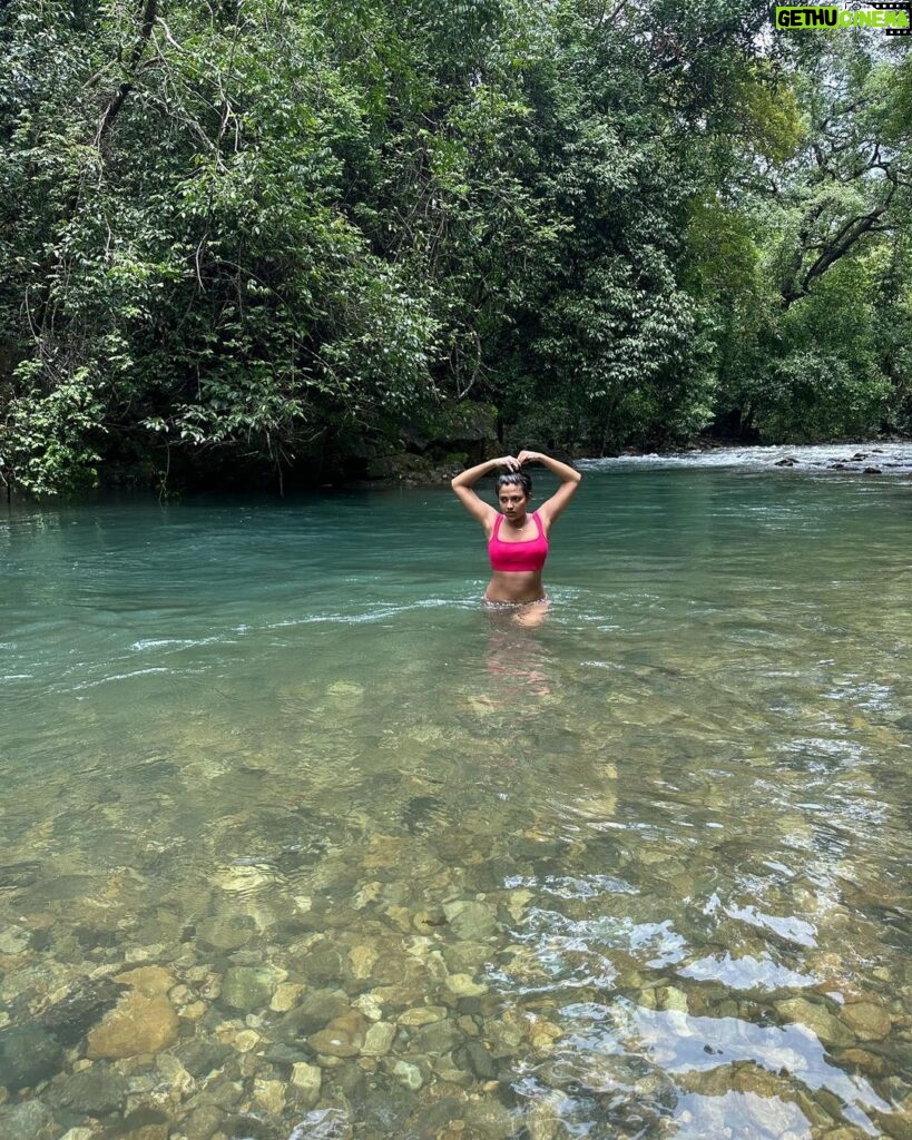 Amala Paul Instagram - Dancing in nature's symphony, where raindrops and waterfalls collide. 🌧💦🌸 #RainyJungleDays #WaterfallWonders #NatureEnchantment #junglelove #monsoonmagic Goa