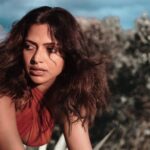 Amala Paul Instagram - Paint It Red ❤️ Captured by:- @chathan__ Production :- @shyamal.ap #artistsoninstagram #naturephotography #blooming #femininepower #goddess #shaktiempowerment #warrior #lightscameraaction #travelgram #fireceandfearless #wanderlust #exploremore #mountainlife #instanature #hikingadventures #exploretheworld #mountainlovers #forestvibes Mudumalai Tiger Reserve