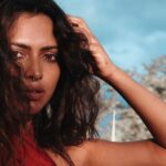 Amala Paul Instagram - Paint It Red ❤️ Captured by:- @chathan__ Production :- @shyamal.ap #artistsoninstagram #naturephotography #blooming #femininepower #goddess #shaktiempowerment #warrior #lightscameraaction #travelgram #fireceandfearless #wanderlust #exploremore #mountainlife #instanature #hikingadventures #exploretheworld #mountainlovers #forestvibes Mudumalai Tiger Reserve