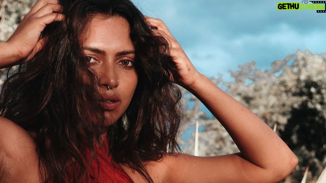 Amala Paul Instagram - Paint It Red ❤️ Captured by:- @chathan__ Production :- @shyamal.ap #artistsoninstagram #naturephotography #blooming #femininepower #goddess #shaktiempowerment #warrior #lightscameraaction #travelgram #fireceandfearless #wanderlust #exploremore #mountainlife #instanature #hikingadventures #exploretheworld #mountainlovers #forestvibes Mudumalai Tiger Reserve