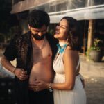 Amala Paul Instagram - Did you know? Research spills the beans that a man’s stomach grows almost as much as his wife’s during pregnancy! 👫🤰💑 Time to debunk the myths - it’s not just “SHE’S PREGNANT,” but “WE ARE PREGNANT!” Sorry Husband 😜 Hit that heart button if you’re on board with the revolutionary concept of shared pregnancy bumps 😏 Drop your thoughts in the comments below 🙃 . . . Directed by @imobinnn Shot & graded by @mohitkapil Managed by @connectbyocd #pregnancymyths #onewiththeotherhalf #wearepregnant #tummybuddies #sharedlove #loveisallweneed #wegotthatglow #PregnancyJourney #ExpectingParents #BumpWatch #ParenthoodAdventure #PregnancyJoy #BundleOfJoy #WeAreExpecting #BabyBumpChronicles #ParentingAdventure #PregnancyAnnouncement #JourneyToParenthood