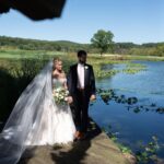 Amanda Jane Cooper Instagram - The story…in an unexpected turn of events, due to the pandemic we were last minute legally married in a courthouse in New York City in mid-March 2020, followed by an also unexpected but no less meaningful Zoom ceremony with our people in April 2020. The @nytimes shared our journey with their readers a month later in May of 2020. The day pictured above is September 19, 2021 when we got to renew our vows and celebrate in person! It was an even sweeter gift to be with everyone than I could’ve imagined. Also, we now have like 14 anniversary dates. 🙈 Lots to be thankful for. Thank you Jesus. @andrewbellnyc 🤍 Photos by @alnimages Flowers by @customflorals Photobooth by @poserphotoboothco Coordination by @aliceissacproductions Video by @snappedstudios Music & lighting by @serenitytheprophet with @eclipsedjs Makeup by @makeupbyemilydimant Hair by @chelseytaylorhair Custom jewelry by @marrincostellojewelry Pennsylvania