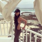 Amanda Zhou Instagram - Do you like pina coladas and getting caught in the rain? . . Sometimes work catches up to you and I am a major workaholic but trying to work on letting things drop, and to just be present with loved ones. This is why being away is so great, I am also forced to leave my phone down. The sun is really blinding anyway to look at my screen 🤓 unless it’s a rainy day like this. But seriously, it’s just so much easier to not look at my phone and take in everything around me, beautiful laughters, beautiful bodies, music, scenery, the sound of the waves...take me back! #daydreamer #bringmeback #sea #allinclusive #bikiniallday #gazebo #relaxedhair #justchill