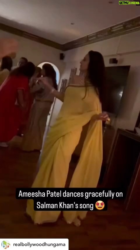 Ameesha Patel Instagram - Posted @withregram • @realbollywoodhungama @ameeshapatel9 looks stunning in that yellow saree. We definitely took some fashion notes from this wholesome look. 🤩