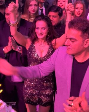 Ameesha Patel Instagram - THAILAND— PATTAYA—- About last nites Event —- club opening with my lovely friend @arbaazkhanofficial 
Dressed by n wearing @rockystarofficial n @rockystar100