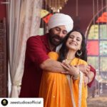 Ameesha Patel Instagram - Posted @withregram • @zeestudiosofficial In a world of chaos, a hug works like magic! 🫂 @iamsunnydeol @ameeshapatel9 Gadar2 #ZeeStudios