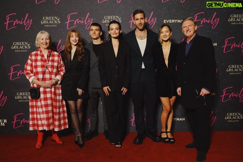 Amelia Gething Instagram - Genuinely so honoured and proud to be part of such an incredible film! And to be standing alongside this amazingly talented and lovely cast & crew is a privilege that I am very grateful for - last night was so fun! Emily is a beautifully powerful film and I cannot wait for you to see it 🖤 💄 : @es_hmua 👗 : @tillywheating @eudonchoi @jimmychoo @tasaki_intl #emilymovie
