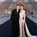 Amy Jackson Instagram - What a way to start Paris Fashion Week - @lancomeofficial in the Louvre 🤍 80s inspired look created by the glam team ‘a dreams ✨ @shaquillerw 🤍 @zuhairmuradofficial @thebradylea giving me that Sharon Stone quiff & @louise_garnier on glass like skin and lashes for days 💁🏻‍♀️ Louvre Museum Paris
