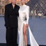 Amy Jackson Instagram - What a way to start Paris Fashion Week - @lancomeofficial in the Louvre 🤍 80s inspired look created by the glam team ‘a dreams ✨ @shaquillerw 🤍 @zuhairmuradofficial @thebradylea giving me that Sharon Stone quiff & @louise_garnier on glass like skin and lashes for days 💁🏻‍♀️ Louvre Museum Paris