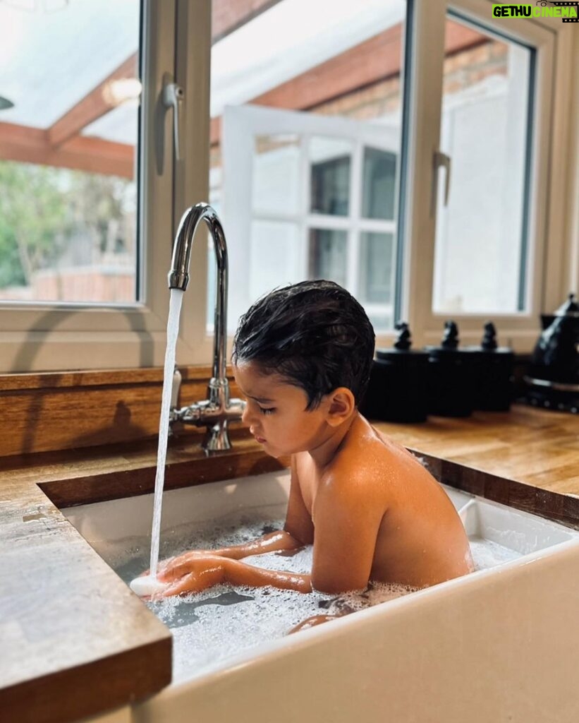 Amy Jackson Instagram - What this Summer is all about ✨ my boys, my furry boys, candy floss and @aloyoga bucket hats, waterfights and sink baths at Grandma’s house… and a whole lotta laughter ✨