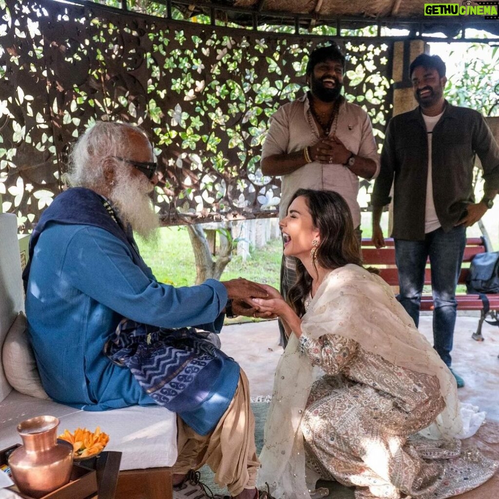 Amy Jackson Instagram - Privileged moment in Coimbatore with @sadhguru - one of the most inspiring visionaries of our time. In between our movie promotions for Mission, we had the opportunity to visit Isha Yoga and meet with the creator himself and learned about his own mission concerning holistic well-being and sustainable causes - all of which is having a hugely positive impact on the world we live in. Whilst spending time with Sadhguru, we discussed all sorts of subjects from raising HAPPY, healthy children, to the world’s future mental health crisis and the importance of creating an environment that fosters wellbeing for ourselves. Mindful eating was a big talking point and having the connection between the food we consume and the health of the soil it comes from - which is currently in a deeply concerning state and why Sadhguru went on a 100 day ‘motorcycle mission’ to save soil! So, thank you Sadhguru your transformative teachings and support for noble initiatives make a profound difference in the world. It was such an honour spending time with you and your volunteers ✨ I can't wait to visit again soon. Also, so much love to @anitadongre for the stunning Salwar I wore for the occasion. Anita continuously promotes traditional crafts and artisans, and advocates for responsible fashion. I love her designs 💘 Swipe to the end for a giggle!!!