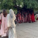 Amy Jackson Instagram - Privileged moment in Coimbatore with @sadhguru - one of the most inspiring visionaries of our time. In between our movie promotions for Mission, we had the opportunity to visit Isha Yoga and meet with the creator himself and learned about his own mission concerning holistic well-being and sustainable causes - all of which is having a hugely positive impact on the world we live in. Whilst spending time with Sadhguru, we discussed all sorts of subjects from raising HAPPY, healthy children, to the world’s future mental health crisis and the importance of creating an environment that fosters wellbeing for ourselves. Mindful eating was a big talking point and having the connection between the food we consume and the health of the soil it comes from - which is currently in a deeply concerning state and why Sadhguru went on a 100 day ‘motorcycle mission’ to save soil! So, thank you Sadhguru your transformative teachings and support for noble initiatives make a profound difference in the world. It was such an honour spending time with you and your volunteers ✨ I can't wait to visit again soon. Also, so much love to @anitadongre for the stunning Salwar I wore for the occasion. Anita continuously promotes traditional crafts and artisans, and advocates for responsible fashion. I love her designs 💘 Swipe to the end for a giggle!!!