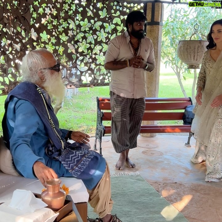 Amy Jackson Instagram - Privileged moment in Coimbatore with @sadhguru - one of the most inspiring visionaries of our time. In between our movie promotions for Mission, we had the opportunity to visit Isha Yoga and meet with the creator himself and learned about his own mission concerning holistic well-being and sustainable causes - all of which is having a hugely positive impact on the world we live in. Whilst spending time with Sadhguru, we discussed all sorts of subjects from raising HAPPY, healthy children, to the world’s future mental health crisis and the importance of creating an environment that fosters wellbeing for ourselves. Mindful eating was a big talking point and having the connection between the food we consume and the health of the soil it comes from - which is currently in a deeply concerning state and why Sadhguru went on a 100 day ‘motorcycle mission’ to save soil! So, thank you Sadhguru your transformative teachings and support for noble initiatives make a profound difference in the world. It was such an honour spending time with you and your volunteers ✨ I can't wait to visit again soon. Also, so much love to @anitadongre for the stunning Salwar I wore for the occasion. Anita continuously promotes traditional crafts and artisans, and advocates for responsible fashion. I love her designs 💘 Swipe to the end for a giggle!!!