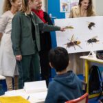 Angelina Jolie Instagram - I had the pleasure of participating in a Bee School a few weeks ago at a primary school in Clichy-sous-Bois, France, to teach the kids the key role bees play as pollinators to our food safety and in biodiversity conservation. The class was lovely. Brilliant young minds asking great questions. Children always understand quickly what adults often try to overcomplicate or excuse. There were many smiles except when they realized that without bees there was no chocolate! We discussed how the disappearance of bees is a worldwide phenomenon which is endangering biodiversity. These are the kinds of committed daily actions you can do with your kids at home: 1. Plant ‘melliferous’ - pollen and nectar-rich plants - to create a safe habitat and substantial food source for bees. 2. Set up your own bee waterer at home. Bees need water, not only to quench their thirst, but also to nurse developing larvae and keep their nests cool during summer. This is how you can create a safe bee waterer at home: * Grab a large bowl, not made of plastic or aluminum. It is important that the materials are porous or mineral, so that the bees can have a better grip and avoid drowning. Such materials let water fill in the little gaps more easily, allowing bees to drink. * Add water and rocks, stones and/or pebbles. Corks can also be a good alternative. * Place the waterer in your garden. Bees must be able to access it easily, so it should be left out in the open, in a large enough area that is free of any safety hazards. @Guerlain #GuerlainBeeSchool #GuerlainforBees Photography by Ian Gavan More information about the bees can be found in the Assessment Report on Pollinators, Pollination and Food production by IPBES. Link in my bio.