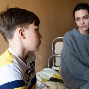 Angelina Jolie Instagram - While I was in Lviv a few days ago, I was shown a “special stone” found by a little girl. The little girl who found it didn't realize the stone she was playing with was in fact a piece of shrapnel from a bomb. Sitting in the palm of your hand, it’s jagged and heavier than you would expect. Its shine and unusual nature must have caught the child’s eye.  When a bomb or shell explodes, sharp fragments of heavy metal tear into the bodies of those near the point of impact. Many of the children I met from the Kramatorsk train station bombing had pieces of shrapnel recently removed - a difficult and painful process. Fragments close to vital organs were too dangerous to remove, and remained inside some of the children’s bodies.  There is no sense to be made from such harm to children, that goes beyond physical injury to the emotional and mental manifestations of trauma.  The fight to end a war, like the one being suffered in Ukraine, is a race to limit the number of casualties killed, injured, displaced and traumatized every day. #ukraine #childreninconflict