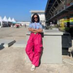 Angie Ang Instagram - Pertama kali nonton @motogp sampai rambut lepek karena ikutan selebrasi podium 😂 Jadi gadis pink dan gadis bercelana ventilasi, juga sudah membirukan Mandalika bareng sama tim @federaloil_id selama weekend kemarin 😍 Sampai ketemu di #indonesianGP selanjutnya, atau di sirkuit lainnya 🤗🤭 Mandalika International Street Circuit