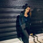Anna Menenakou Instagram - 𝐈𝐧 𝐭𝐡𝐞 𝐡𝐞𝐚𝐫𝐭 𝐨𝐟 𝐝𝐨𝐰𝐧𝐭𝐨𝐰𝐧, 𝐭𝐢𝐦𝐞 𝐬𝐞𝐞𝐦𝐬 𝐭𝐨 𝐬𝐭𝐚𝐧𝐝 𝐬𝐭𝐞𝐞𝐥, 𝐚𝐬 𝐭𝐡𝐞 𝐰𝐨𝐫𝐥𝐝 𝐛𝐮𝐳𝐳𝐞𝐬 𝐚𝐫𝐨𝐮𝐧𝐝 𝐲𝐨𝐮. Athens, Greece