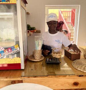 Antonio Dikele Distefano Instagram - Lei è mia madre.
Oggi abbiamo finalmente aperto la nostra prima attività insieme in Angola. 
“Dikele Internet Cafe” è uno spazio ispirato al modello Starbucks dove i ragazzi delle scuole possono studiare, guardare la televisione via cavo e avere accesso a internet di fronte ad un succo e i dolci tipici angolani.

Non so se si capisce dalla foto ma mamma è molto felice.