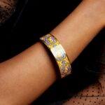 Ariel D. King Instagram - Presenting my wrist! @hermes 🪄…and just like that 🐎 _______________________________ #hermes #enamelbangle #hermès #hermesbangle