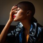 Ariel D. King Instagram - Bald Head Aerodynamics with @marcelphoto on a side note why can’t I find the collaboration button… _________________________ #lips #aerodynamics #bald #baldgirl #fashion #redlips Los Angeles, California