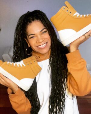 Arisa Cox Instagram - *I’M LOOKING FORWARD TO THESE…. this is a pic from like Feb 😭😂*
I’m so READY for the summer and getting braids back… and ready to stunt in my favourite custom @tresolz kicks… I have size 11/12 feet (!!!) and if you’re in the same boat and also love glam, THIS is the brand for you… a Canadian Black woman-owned company that will make you feel like a million bucks on a stage or chilling in a park - without the million-buck price tag! And with braided tresses by Tianna from @joujouhair (another Canadian Black woman-owned company)… I mean… that’s a hot girl summer right there 💜 @tresolz @lisawilliamsstyle #braidsbytianna