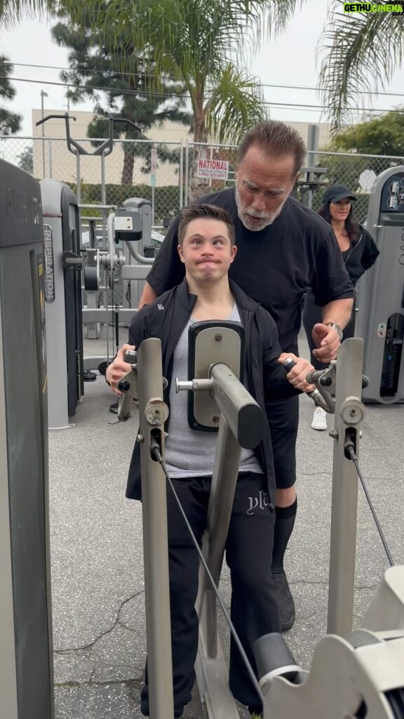 Arnold Schwarzenegger Instagram - I’ve been truly blessed to have been trained by some of the greatest athletes on the planet. Sincerest thanks to @schwarzenegger for spotting today @goldsgymvenice1 #greenrangerkyle #downsyndrome #downsyndromebodybuilder #bodybuilding #bodybuilderlifestyle #body #weightlifting #fyp #fypシ #fypage #explorepage Golds Gym Venice Beach