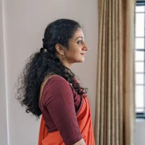 Arsha Baiju Instagram - Meenakshi's look test❤
8th February 2022.
I lost some weight when I went for the look test because our director @abhinavsnayak wanted me to be slim for our movie.
Since this orange is Abhinavettan's favourite colour🤪🤣, this was the first shade costume designer @g_kishore_gk planned out for Meenakshi's saree.
Love these pictures 😚
@abhinavsnayak@adv_mukundanunni
@g_kishore_gk @vineeth84
@where_is_mangu @o_viswajith @jomy_vj @thehalfdrunk 
#mukundanunniassociates #runningsuccessfully
