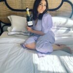 Ash London Instagram - What do you do when you’re in a super cute hotel room ( @thestrand_hotel ) enjoying a bottle of French bubbles with @hey_itsv? Photo shoot, bien sur!!! 💄 💇🏻‍♀️ @paulinedemirjian The Strand Hotel