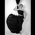 Ashika Yash Instagram - SHADES OF BLACK🌑 She was not exactly typical Maybe what you would call distinct Finding bliss in the odd And her metaphors, Completely unusual Many a time pondered The meaning of peace A million descriptions Tho all disappointingly similar The safety of home With sweet fudgy coffee A little nap on the couch After just finishing a book The smell of scented candles And hot pumpkin pie The sound of swaying bobbles When christmas finally arrives The calm waters of the ocean Gracefully caressing our feet The little evening breeze To which the flowers dance with glee The mellifluous song Of cute little birds And the feeling of love During a tight crushing hug But there was That one extra thing Completely outta the ordinary Something that made her want to Fly up sprouting wings Maybe it was what she chose Typhoons over the sun Fall over spring The way she liked the ocean Raging rather than serene The way she preferred the wild Over safe security Or maybe the simile she chose "As lovely as fire" Extraordinary, Just like this young lady She does find peace In the quiet and calm But has always, Smiled at the storm. . . . . Photography by @nvn_photography446 Mua by @vanity_tales Saree draping & hair style by @srimathi_hairstylist . #conceptphotography #blackandwhitephotography #photography #photoshoot #bold #blogger #vlogger #instablog #instablogger #chennaimodels #chennaimodel #model #instawritings #purewords #emotions #writingcommunity #writings #shortwritings #artist #youaremorethanablessing #hariteck #beyondblessings #ashikayash