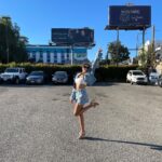 Ashley Nicole Williams Instagram - so I ironically wore the same jean outfit 2 1/2 years ago in front of our first billboard as I did in front of our last. and boy has baby grown. if I could hug that girl and hold her tight, say ya did it kid. 3 seasons as a lead on a tv show. I’m so proud of you. proud of us. cheers to these final episodes, cheers to 4 years of making this show and 3 wildly beautiful seasons, and cheers to leaving a mark on anyone and everyone who loves our show as much as we do. This final season is and always will be for you guys. See u tonight for episode 6. Goddess protect. 🤍 AB