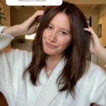 Ashley Tisdale Instagram - Here’s how I’ve been styling my hair lately! I’ve been loving this wavy look with a slight bend. Also, I’ve been growing out my bangs and it’s been a process to say the least! Let me know if you guys have any styling tips for growing them out 🤍
