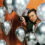 Ashton Irwin Instagram – Peekaboo! I’ll see you at the 5SOS SHOW 2023! I’m hearing the tickets are going fast and some of them are already totally gone. I’ll see you soon everyone. it’s gonna be an excellent summer with you & @5sos 

Thanks Andy for the cheeky photo @andydeluca Los Angeles, California