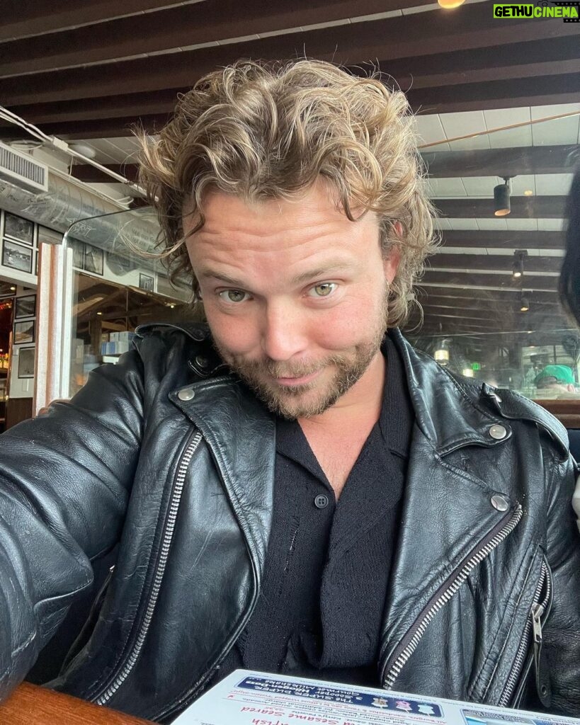 Ashton Irwin Instagram - 28, brushing up on my essential Buddhism , starting to wear the cowboy hat seriously, returning to the social security of a leather jacket & pressure washing at a pretty serious level now. And the last one with the thumbs up at LAX, is a guy who’s just hoping he didn’t get Covid in the airport, ciao!