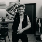 Ashton Irwin Instagram - pass the Pitú on the left hand side 🎉 good vibes backstage with @ryanfleming. This bottle of Brazilian rum was a gift from a lovely fan! We receive many gifts from place to place and just wanna say thank you for sharing your culture’s through these gestures! A lot of the time we can’t get out to see everything we wanna see where we travel so the things you send us make a big difference when it comes to getting a vibe for where we are! ✌️❤️ São Paulo, Brazil