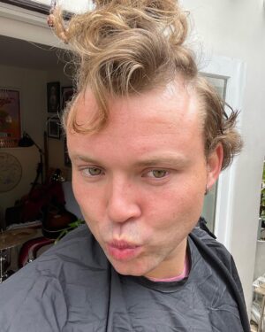 Ashton Irwin Instagram - Haircut time. 
I have that natural grinchy whoville cuteness ya know what I’m saying? Looking very grinch-esque but in a drummer guy way. Anyways, caption done, on ya bike!!