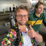 Ashton Irwin Instagram – 28, brushing up on my essential Buddhism , starting to wear the cowboy hat seriously, returning to the social security of a leather jacket & pressure washing at a pretty serious level now. And the last one with the thumbs up at LAX, is a guy who’s just hoping he didn’t get Covid in the airport, ciao!