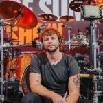 Ashton Irwin Instagram – Watch Ashton Irwin breaking down some of his favorite 5SOS drum parts! 👊🏼

From conceptualizing the live shows and crafting merchandise, Ashton explains how the band members’ involvement goes beyond playing their instruments. But what truly sets him apart is his incredible ability to sing while drumming, a feat that’s not just about musical talent but also demands exceptional independence, fitness, and a unique focus on vocal support. 🎤

Click the link in our bio to watch the full #DrumeoBackstage interview where he talks about his early inspiration for playing the drums and how he got started at a young age, drawing inspiration from bands like The Police and Led Zeppelin. 🎬

@ashtonirwin  @5sos 

#5SOS #5SecondsOfSummer #5SOSFam #5SOSFamily #5SOSFans #AshtonIrwin #5SOSDrummer #Drumeo #DrumLife #Drummer #Drumming #DrummingPassion #LukeHemmings #CalumHood #MichaelClifford #Youngblood #5SOSMusic #5SOSLyrics #5SOSConcert #5SOSLive #5SOSMerch #5SOSUpdates #5SOSAlbum #5SOSArt #5SOSFandom #5SOSInfection #5SOSHeartbreak #5SOSTour #5SOSPhotography Budweiser Stage