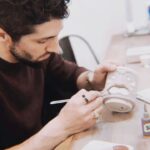Azim Rizk Instagram - serious artist at work . . . . . . . . . . . . . #glazefire #artist #fireitup #theonlymugilleveruse #tiki #tikidude